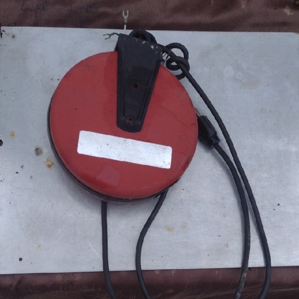 Red Retractable Cord Reel